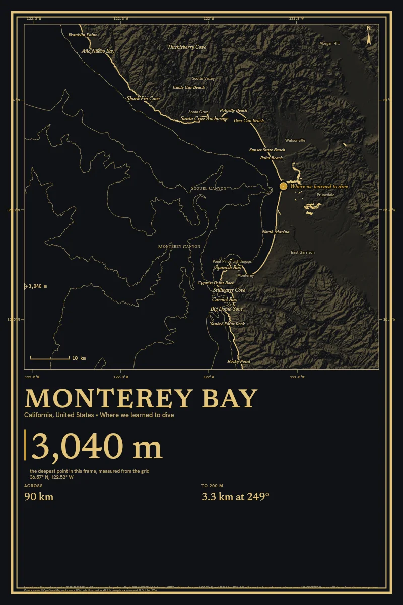 Monterey Bay in Gilt on Black & Gold, its sea floor drawn from the depth grid to 3,040 m, with a sample pin marked Where we learned to dive.